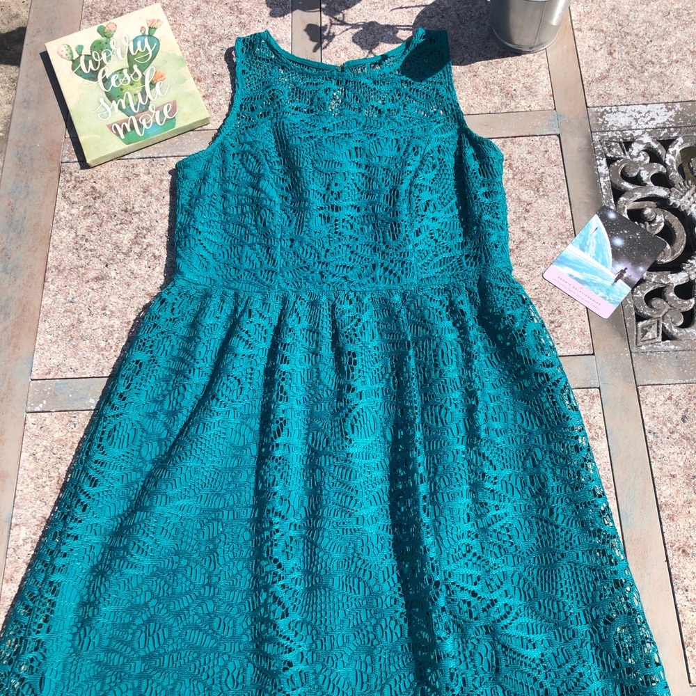 Teal lace dress with exposed gold zipper
